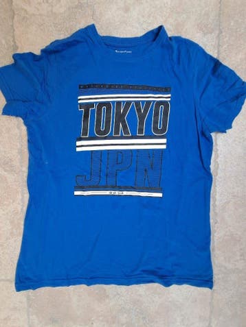 GRATIS: Blauwe t-shirt mt 164 - 170