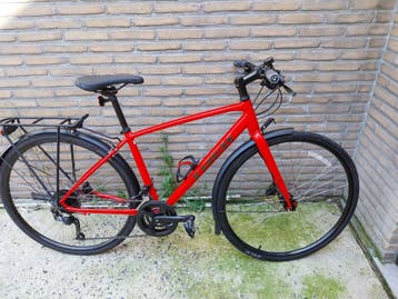 dameskoersfiets met recht stuur