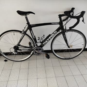 Carbon koers fiets thompson
