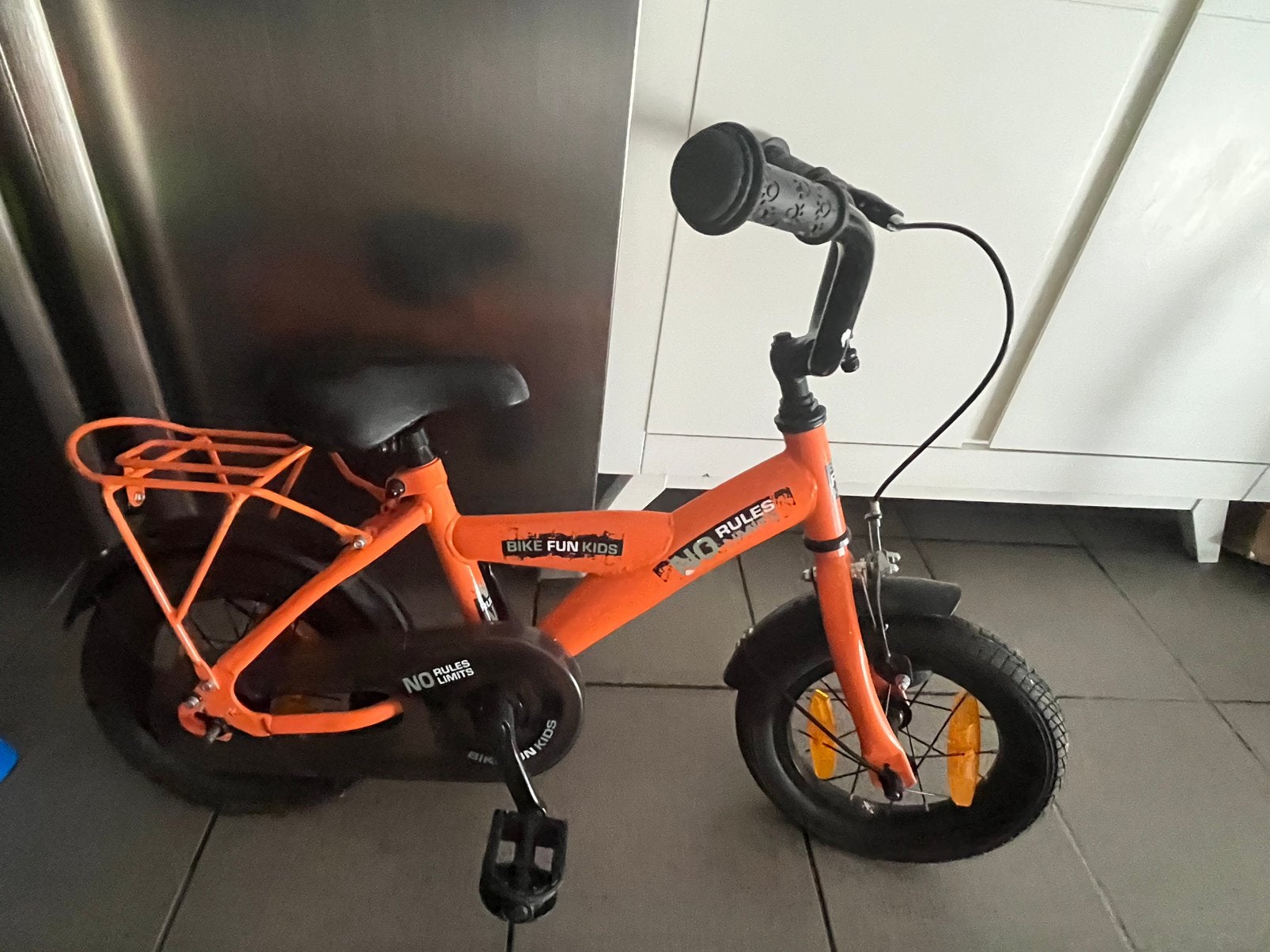 Kinderfiets oranje 14 inch – goede staat