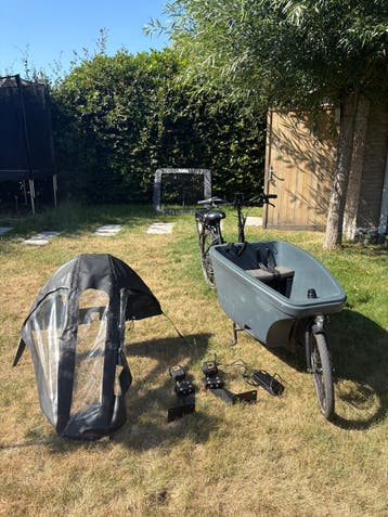 Dolly bakfiets amper 1600km incl. regenkap + maxi cosy hou