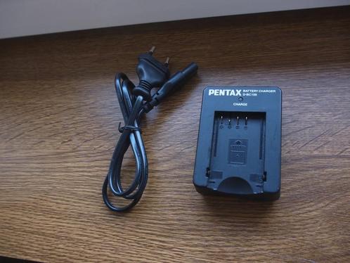 Pentax D-BC109 oplader, Audio, Tv en Foto, Fotografie | Accu's en Batterijen, Zo goed als nieuw, Ophalen of Verzenden