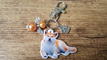 Porte-clés Shiba Inu avec ange gardien