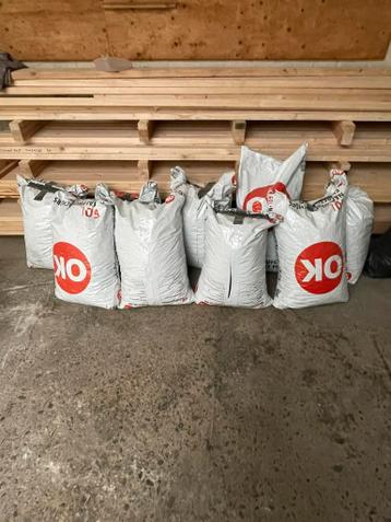 Dennenschors in zakken