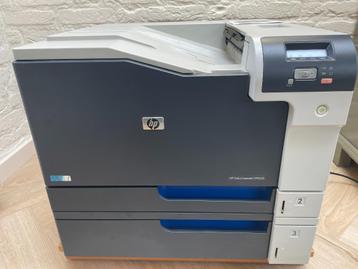 HP color LaserJet CP5225 met extra papierbak org toners 90%