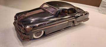 oude speelgoedauto Pontiac, zwart. Jaren '50-'60