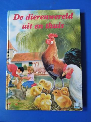 leerrijk kinderboek "de dierenwereld uit en thuis "