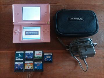 Roze Nintendo DS lite met oplader 7 spellen en opbergtas