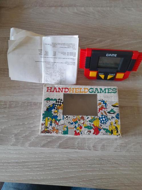 Hand held Games spelletje doosje papieren en game, Games en Spelcomputers, Games | Overige, Gebruikt, Sport, 1 speler, Vanaf 7 jaar