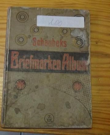 Ancien album SCHAUBEK avec quelques timbres