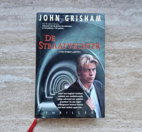 De straatvechter, thriller van John Grisham (hardcover), Livres, Thrillers, Comme neuf, Amérique, Envoi