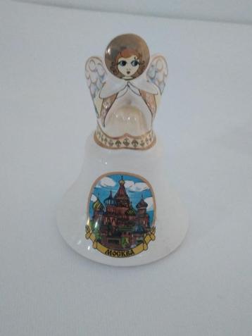 Cloche en porcelaine en forme d'ange