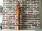 Houten beeld, Ophalen