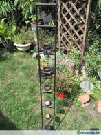 Smeedijzeren steun voor kaarsjes, Enlèvement, Utilisé