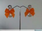 oorbellen NIEUW EN ZELFGEMAAKT Swarovski/oranje strik/parels, Nieuw