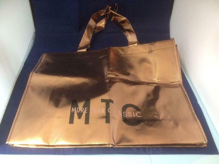 Goudkleurige tas lussen zwarte tekst MTC More than classic, Verzamelen, Merken en Reclamevoorwerpen, Nieuw, Overige typen, Ophalen of Verzenden