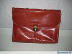 Trousse en style cuir, Gebruikt