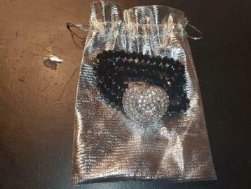 Armband met hartje beschikbaar voor biedingen