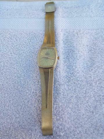 Montre omega 18k 0.750 prix new arrivals