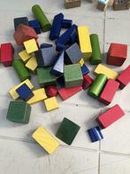 Houten blokken en kuifjesfiguurtjes, Kinderen en Baby's, Speelgoed | Bouwstenen, Ophalen of Verzenden, Zo goed als nieuw
