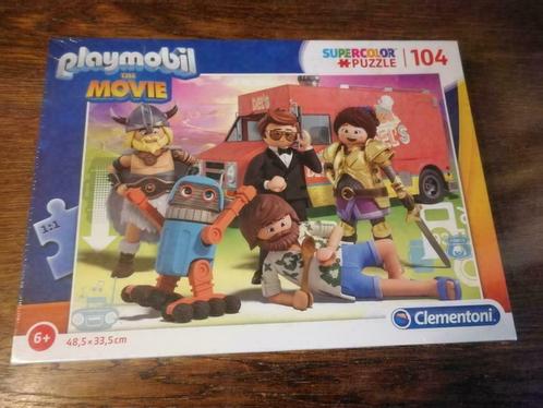 Puzzel Clementoni 104 stukjes Playmobil the movie (NIEUW), Enfants & Bébés, Jouets | Puzzles pour enfants, Neuf, Plus de 50 pièces