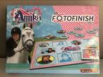 Studio 100 - Amika fotofinish spel, Kinderen en Baby's, Speelgoed | Educatief en Creatief, Ophalen of Verzenden, Zo goed als nieuw