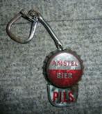 # sleutel hanger in de vorm van een kroonkurk  AMSTEL BIER, Autres types, Utilisé, Amstel, Enlèvement ou Envoi