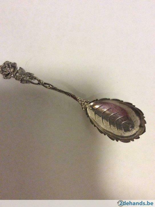 Mooie verzilverde  lepel om suiker te scheppen