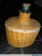 Fles in riete mandje (ovaal van vorm), Ophalen, Gebruikt