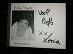 Fotokaart miss xenia met handtekening, Envoi