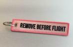 Nieuw : Remove Before Flight Sleutelhanger Roze, Nieuw, Transport, Verzenden