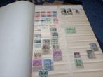 Postzegelalbum met postzegels uit verschillende  landen., Enlèvement
