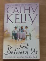 boek "Just Between US"-Cathy Kelly-Engelse roman-634 blz., Nieuw, Ophalen