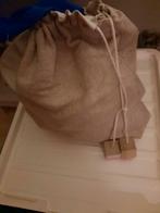 JUTE ZAK MET SOLIDE HOUTEN BOUWBLOKKEN, Enlèvement