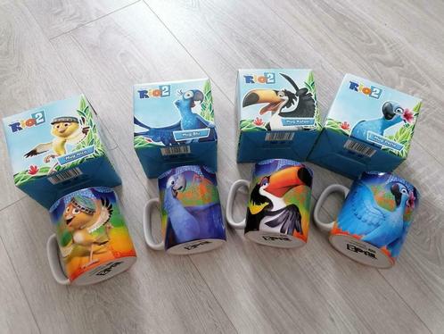 Lot 4 mugs Rio 2 (Nico, Rafael, Perla et Blu) Neufs, Collections, Disney, Comme neuf, Enlèvement ou Envoi