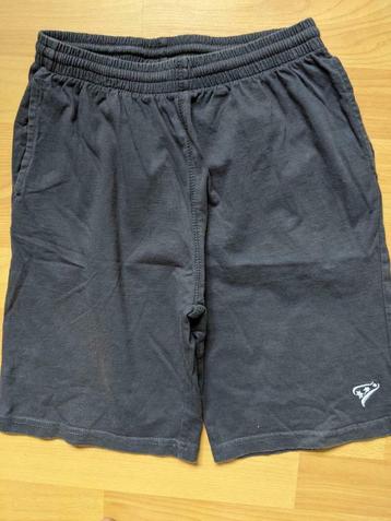 Short de gymnastique Rucanor taille 140, Enlèvement ou Envoi, Utilisé, Rucanor, Vêtements de sport ou Maillots de bain