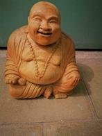 bouddha en bois sculpté, Enlèvement