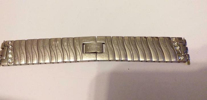 Swatch skin gegolfde horlogeband, Handtassen en Accessoires, Horloges | Dames, Gebruikt, Polshorloge, Swatch, Staal, Staal, Ophalen of Verzenden