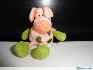 Knuffel in de vorm van een varkentje met groene stippen, Utilisé
