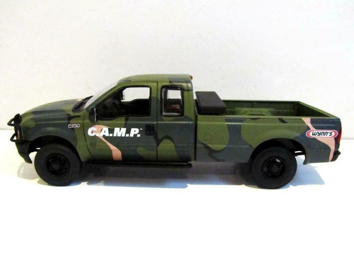 Ford F-250 Pick-up Super Duty C.A.M.P. Wynn's (1:25) + doos, Hobby en Vrije tijd, Modelauto's | Overige schalen, Zo goed als nieuw
