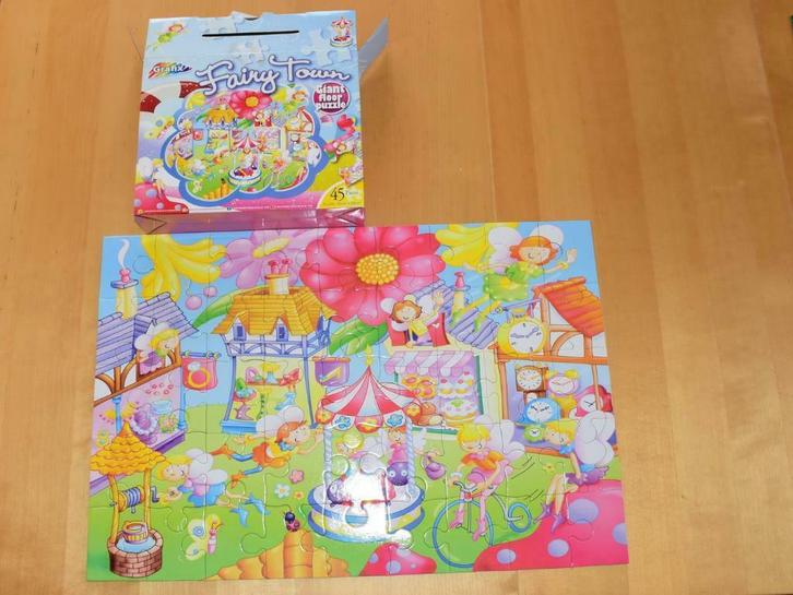 Grafix Vloerpuzzel Fairy Town ( 63 x 43cm ), Kinderen en Baby's, Speelgoed | Kinderpuzzels, Zo goed als nieuw, 2 tot 4 jaar, 10 tot 50 stukjes