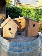 Hard houten vogelhuisjes