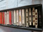 16 opgenomen muziekcassettes in opbergbox