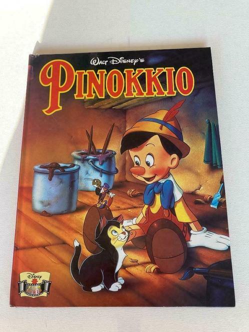 Album de bandes dessinées Walt Disney "Pinocchio" à couvertu, Livres, Livres pour enfants | 4 ans et plus, Comme neuf, Contes (de fées)