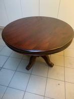 Houten ronde tafel, Ophalen