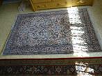 handgeknoopt tapijt India, Ophalen