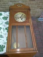 Antieke hangklok, Ophalen