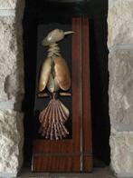 Vogel gemaakt met schelpen, allemaal blinkend materiaal., Ophalen