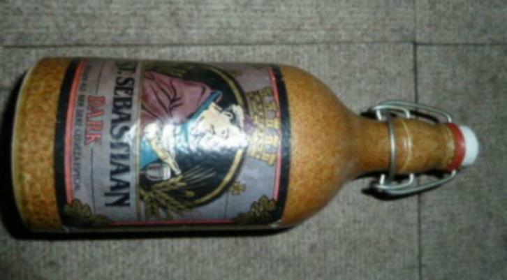 # stenen fles / kruik ST. SEBASTIAAN DARK Brij. Sterkens, Verzamelen, Biermerken, Gebruikt, Flesje(s), Overige merken, Ophalen of Verzenden