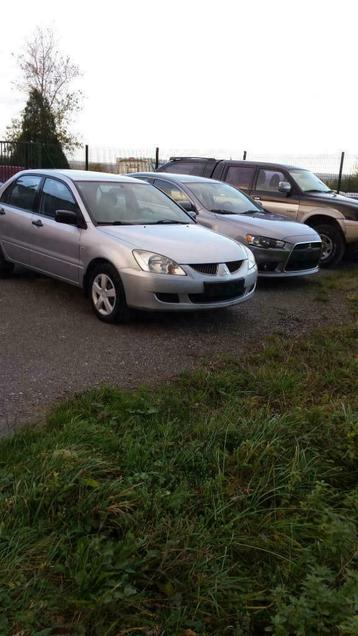 mitsubishi lancer disponible aux enchères